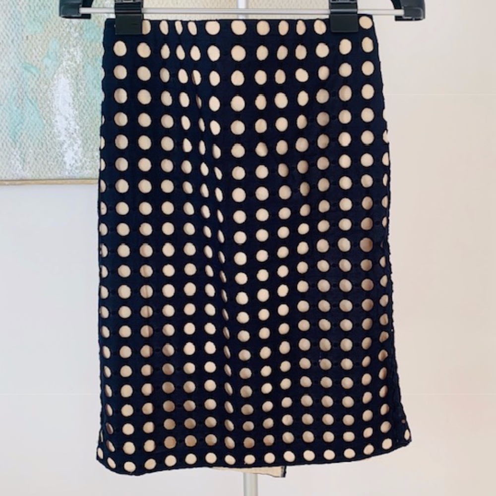 Ann Taylor blue polka dot cut over beige skirt. 4.